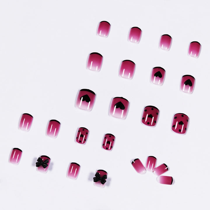Artistic nail extensions with cute bow and heart designs Kalsten
