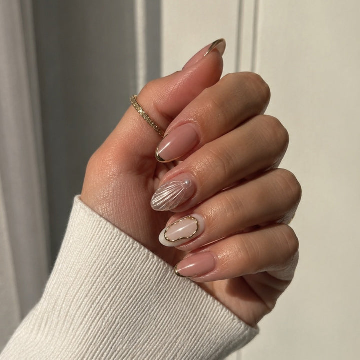 Artistic Press-On Nail Design with Gold Embellishments Kalsten