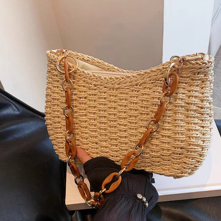 Handcrafted straw bag with golden chain details Kalsten