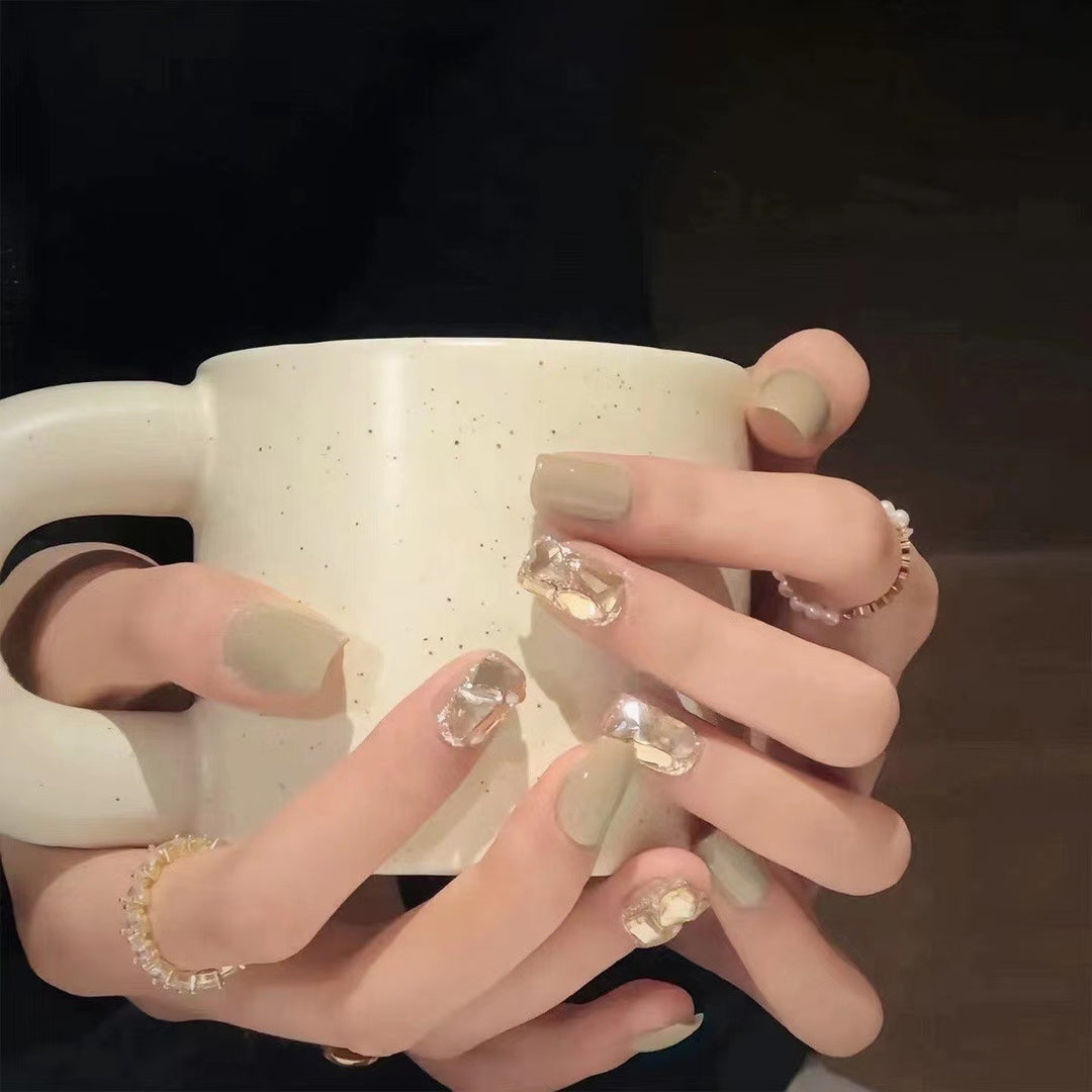 Artful nail art with glitter accents Kalsten