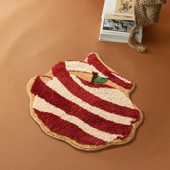Hand-tufted decorative doormat in apple shape made of cotton blend with non-slip bottom Kalsten