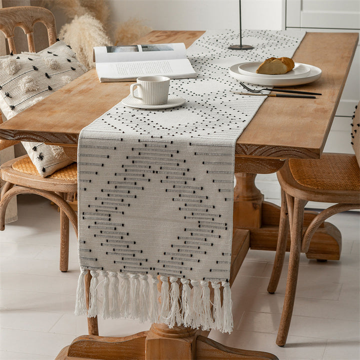 Handwoven table runner made of cotton blend with fringes and geometric dot jacquard Kalsten