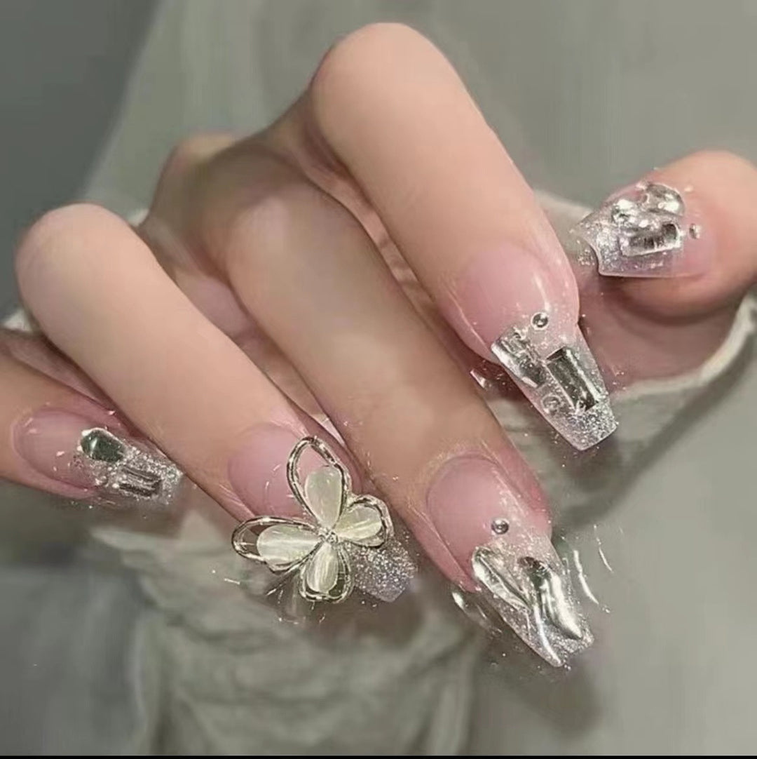 Elegant Nail Art with Glitter and Rhinestones Kalsten