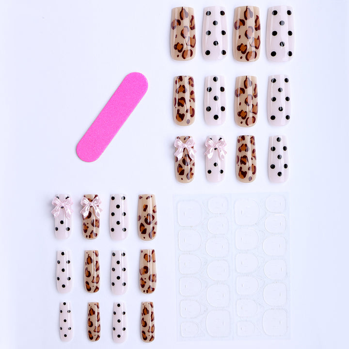 Creative artificial nails with bows and dots Kalsten