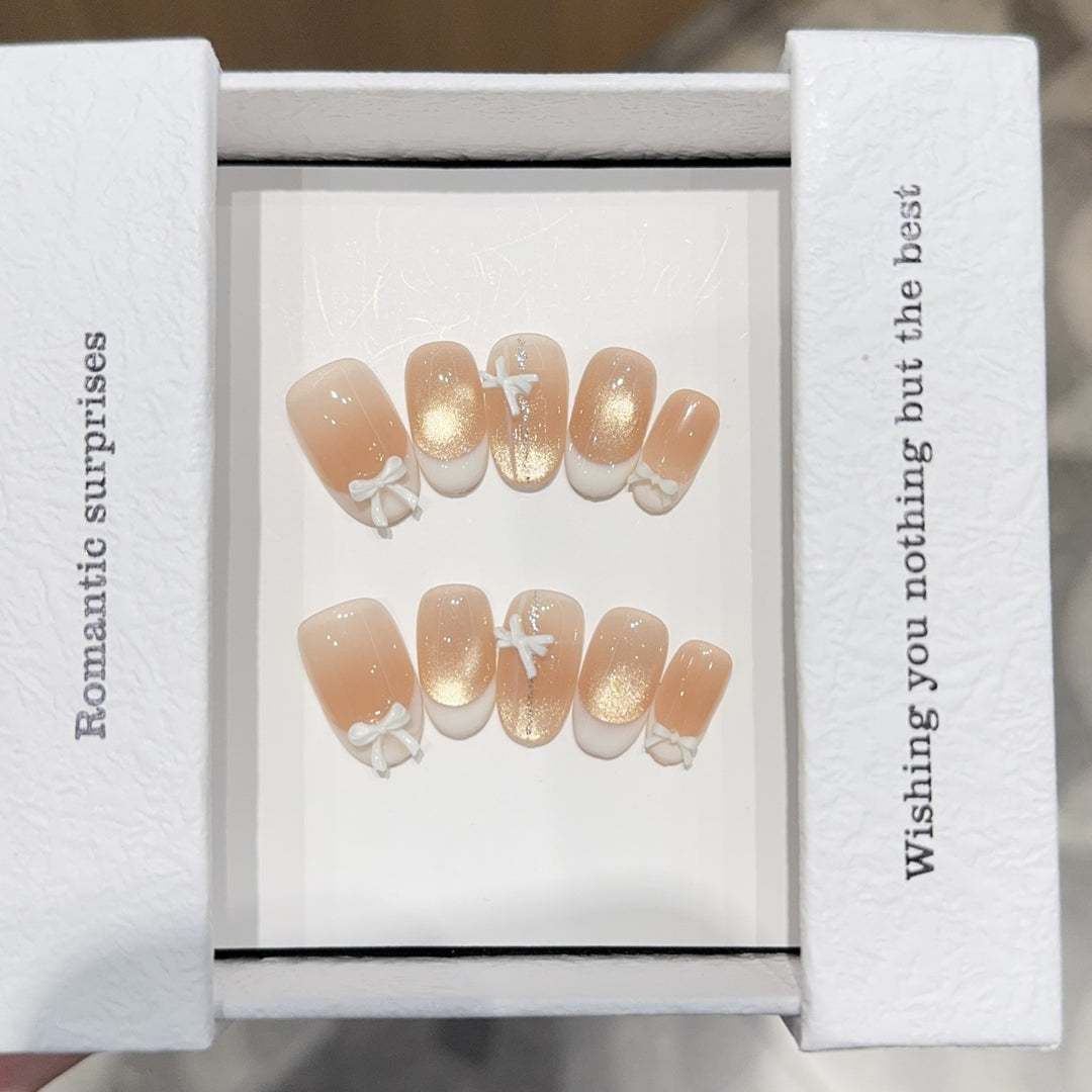 Artificial nails with romantic bow and glitter effects Kalsten