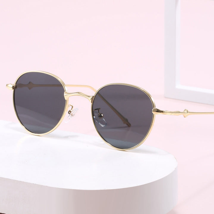 Ladies elegant round sunglasses with stylish metal frame Kalsten