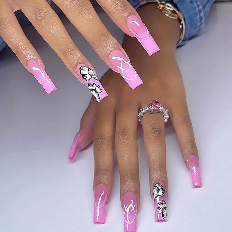 Creative nail art set with floral and graphic designs Kalsten