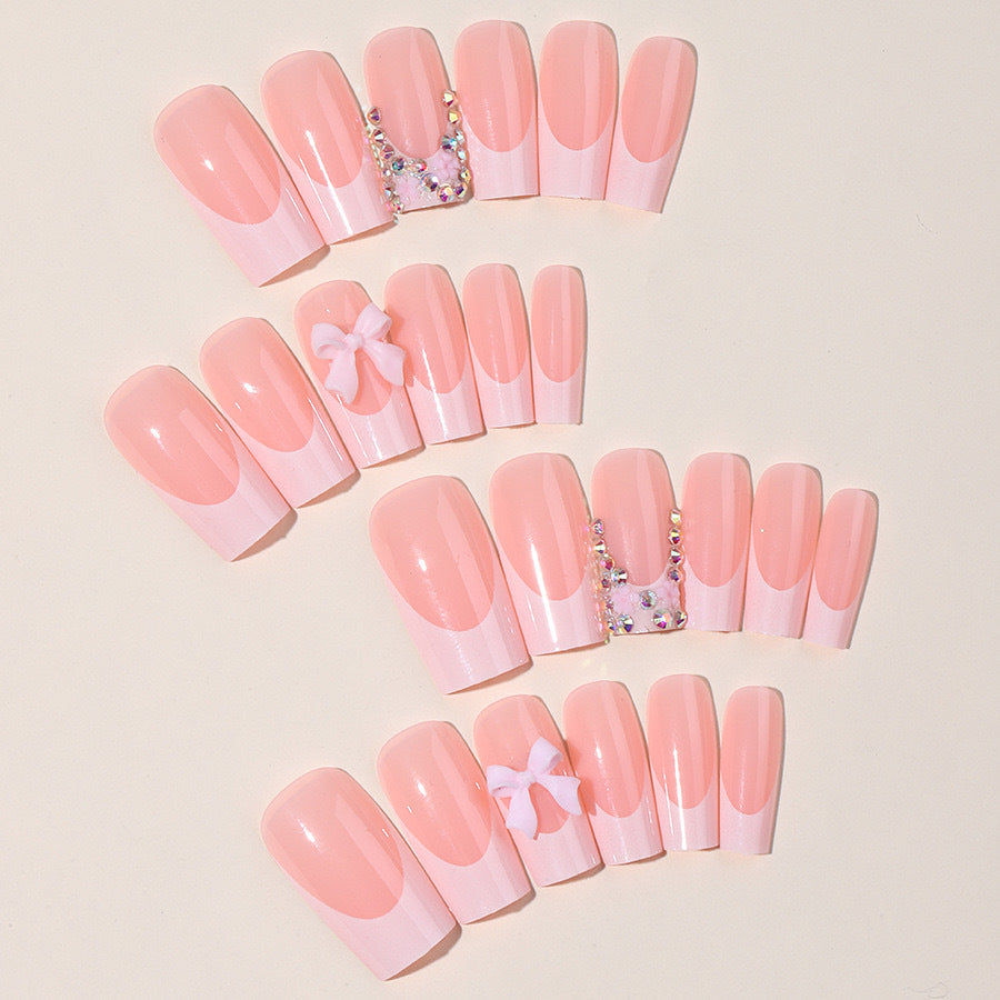 Artifical nail set with glamorous 3D bows and crystal embellishments Kalsten