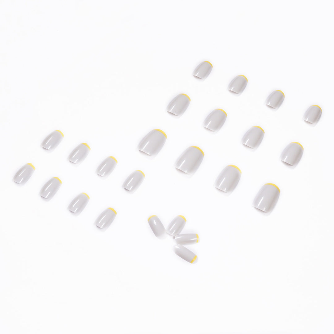 Artistic nail extensions with modern French-tip design Kalsten