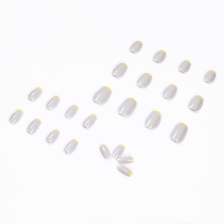 Artistic nail extensions with modern French-tip design Kalsten