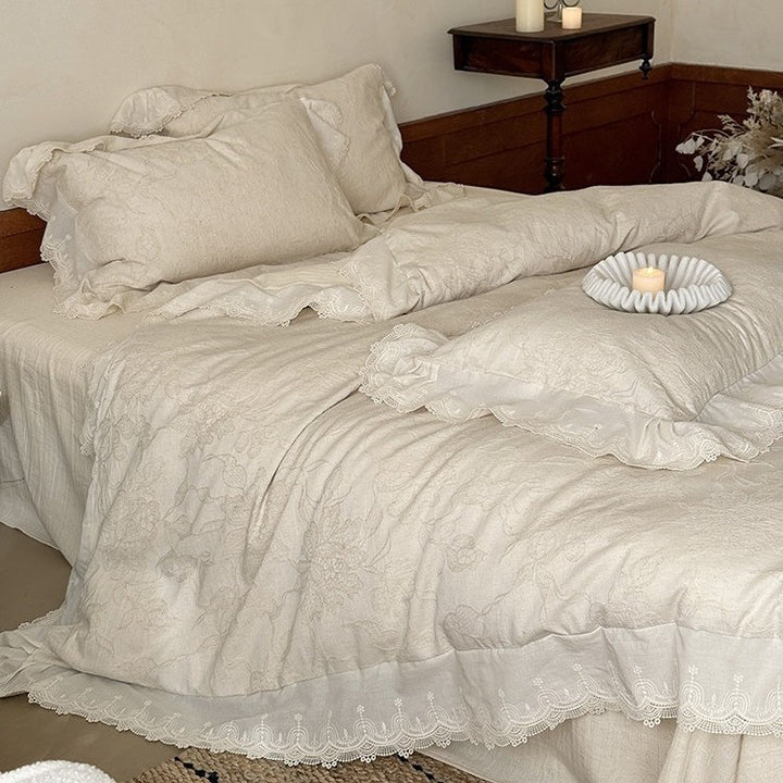 Jacquard bedding set with floral relief pattern and lace border