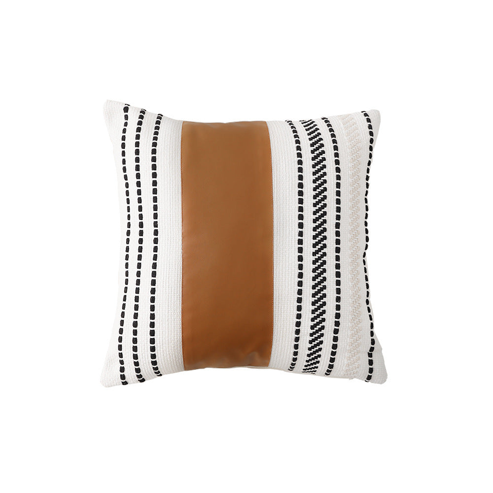 Decorative cushion cover made of faux leather with woven ethnic stripe Kalsten