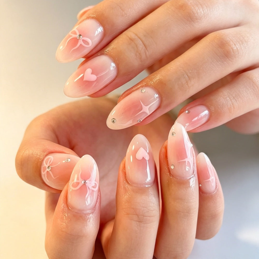 Artificial nails with romantic heart and bow design Kalsten