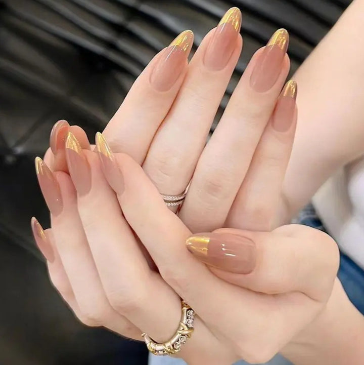 Nail art with elegant gradient and metallic accents Kalsten