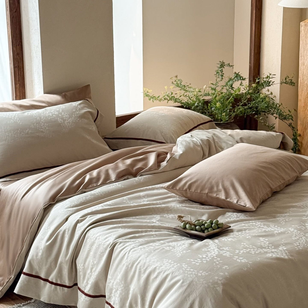 Premium bedding set made of breathable cotton blend with contrasting piping