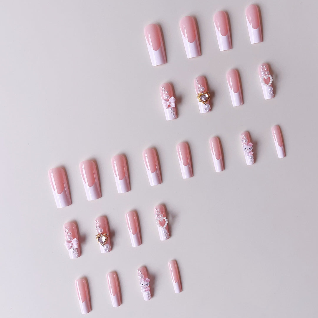 Glamorous artificial nails with 3D decorations and pearl accents Kalsten