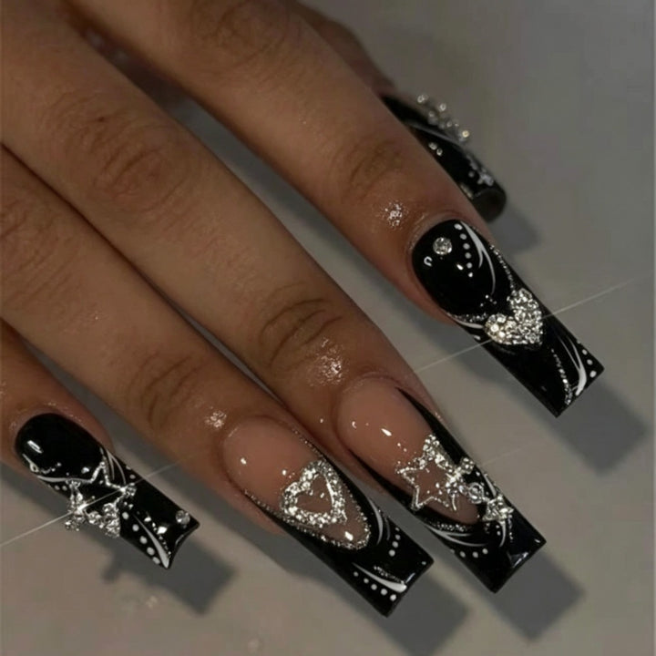 Artificial nails with elegant glitter accents and heart motifs Kalsten