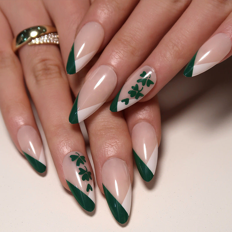 Artistic stiletto nails with cloverleaf design Kalsten