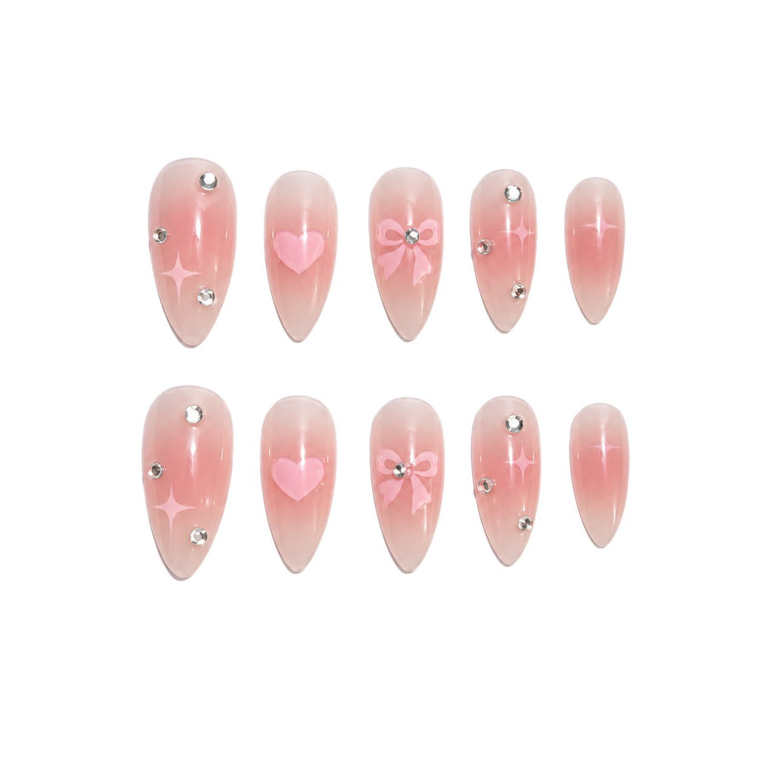 Artificial nails with romantic heart and bow design Kalsten