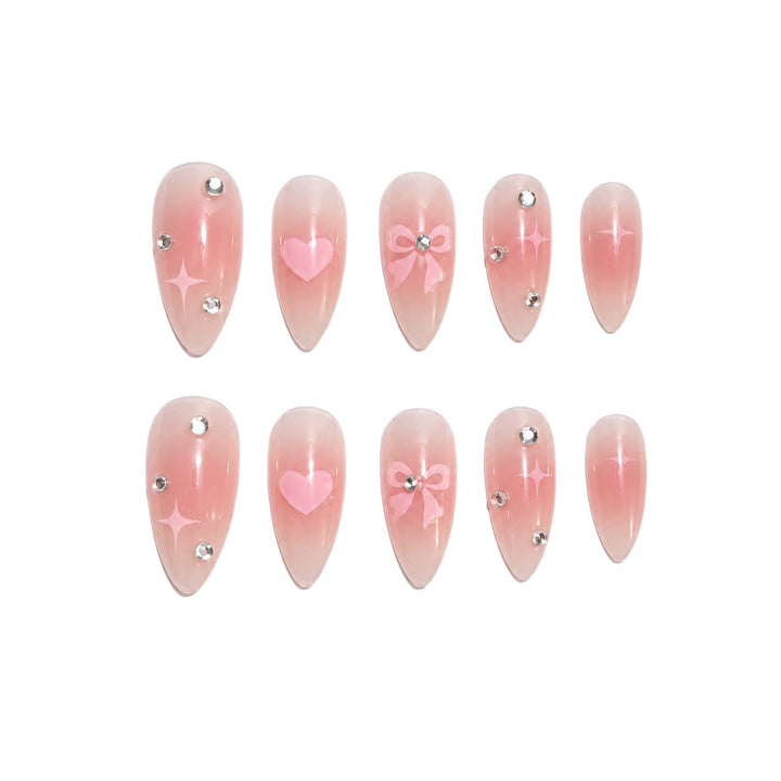 Artificial nails with romantic heart and bow design Kalsten