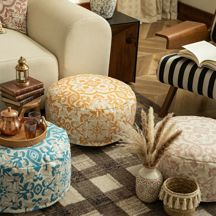 Round floor pouf with woven ornament pattern and carrying handle Kalsten
