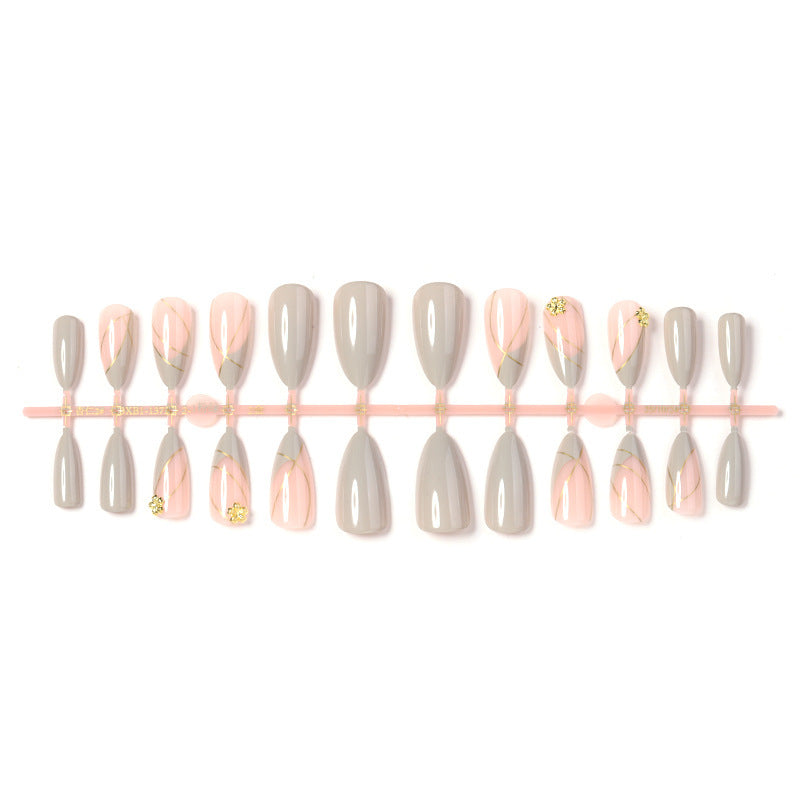 Artificial nail set with elegant marble design and gold accents Kalsten
