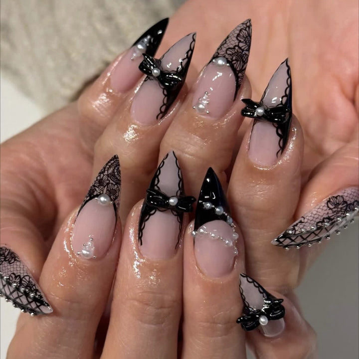 Artful stiletto nails with glitter accents Kalsten