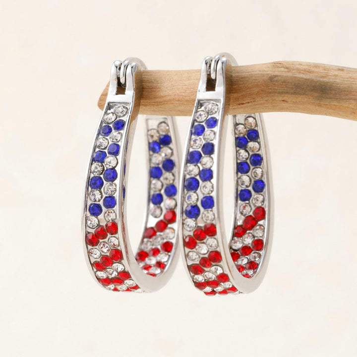 Ladies nano curved clip-on earrings with dense rhinestone embellishment and polished metal alloy Kalsten