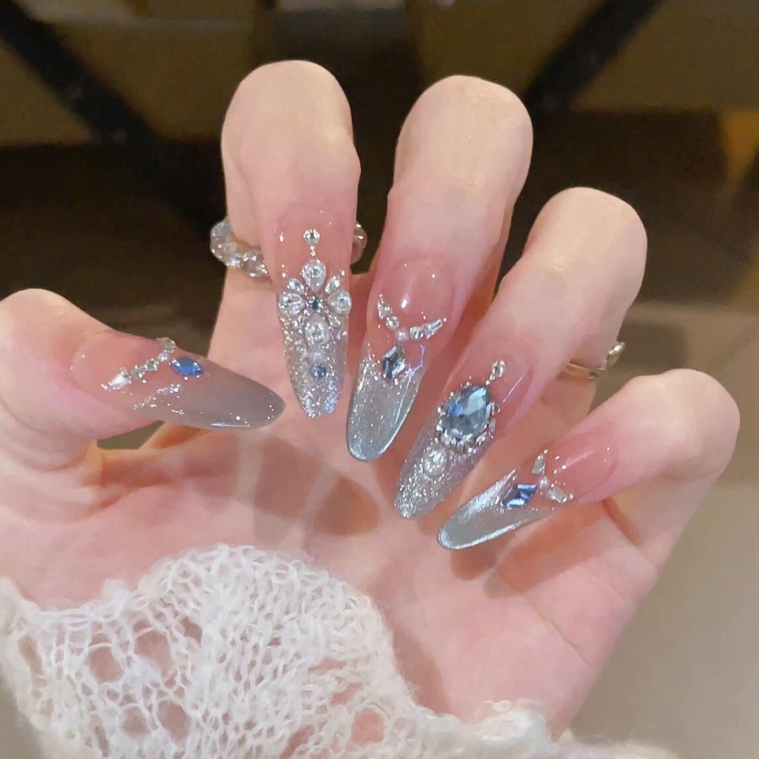 Glamorous artificial nails with sparkling rhinestone accents Kalsten