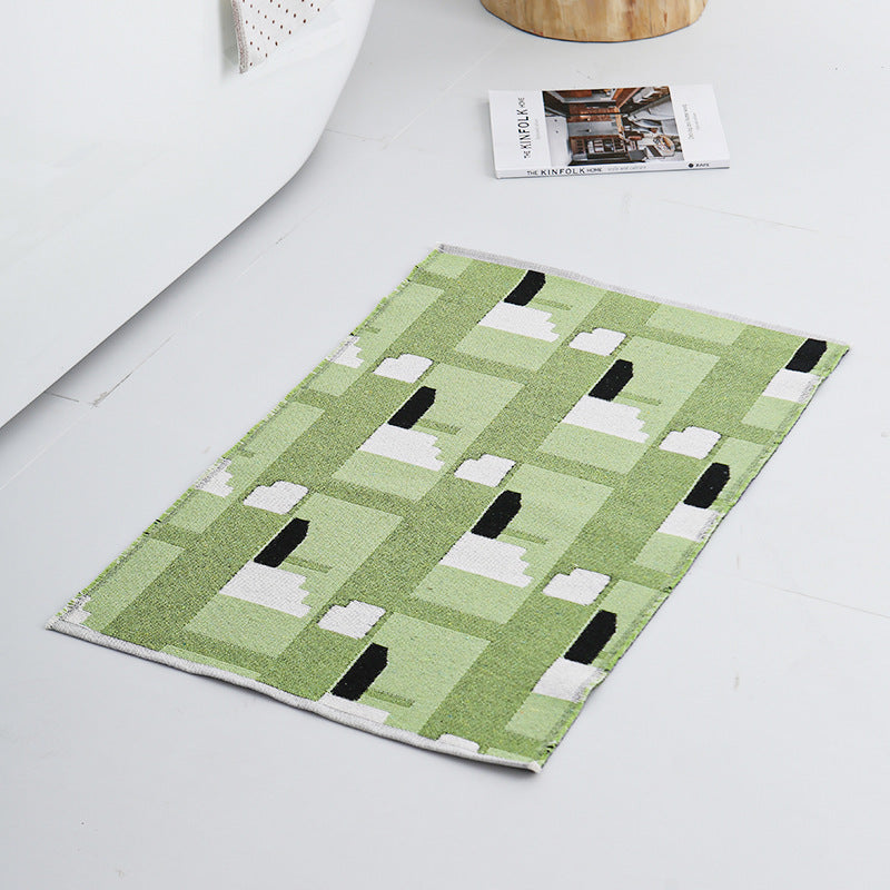 Modern geometric bathroom rug made of flat-woven cotton with non-slip backing Kalsten