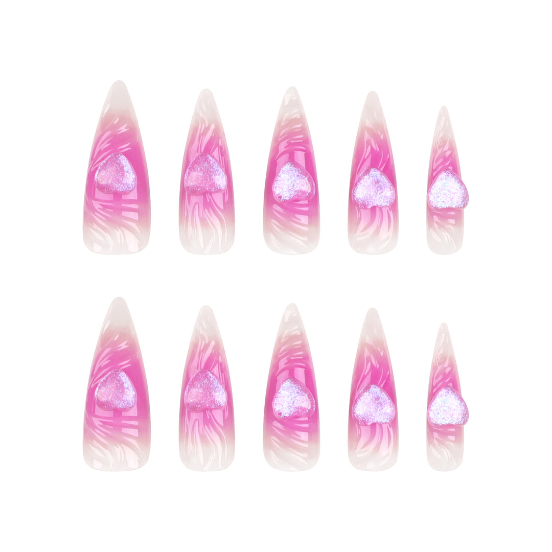 Artistic stiletto nails with heart design and glitter accents Kalsten