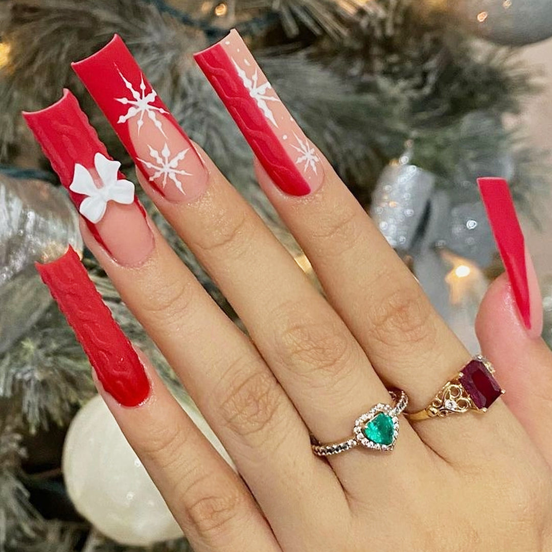 Artificial nail set with festive snowflake and bow motifs Kalsten