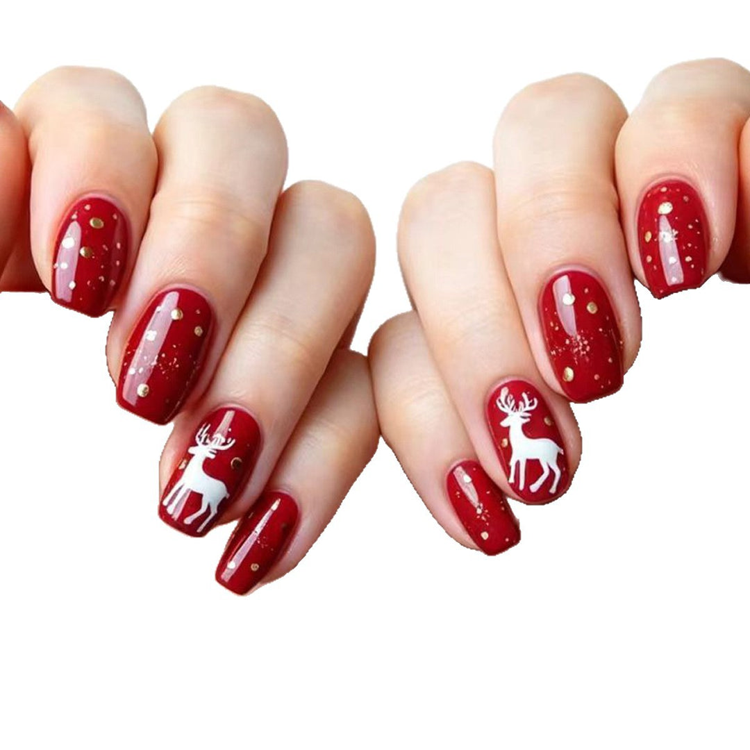 Creative artificial nails with festive reindeer design Kalsten