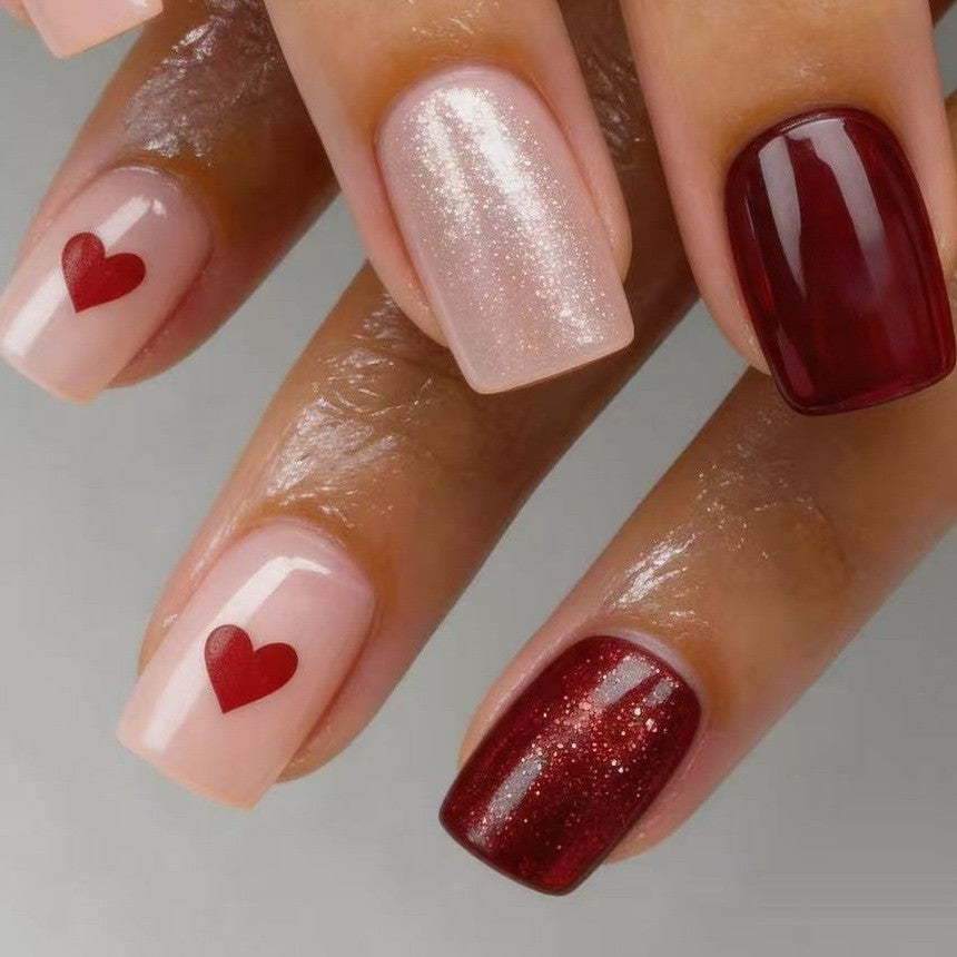 Art nail set with heart designs and glitter Kalsten