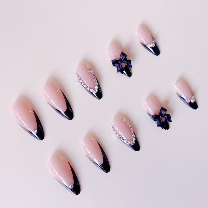Artificial nail set with glamorous 3D bows and rhinestone embellishments Kalsten