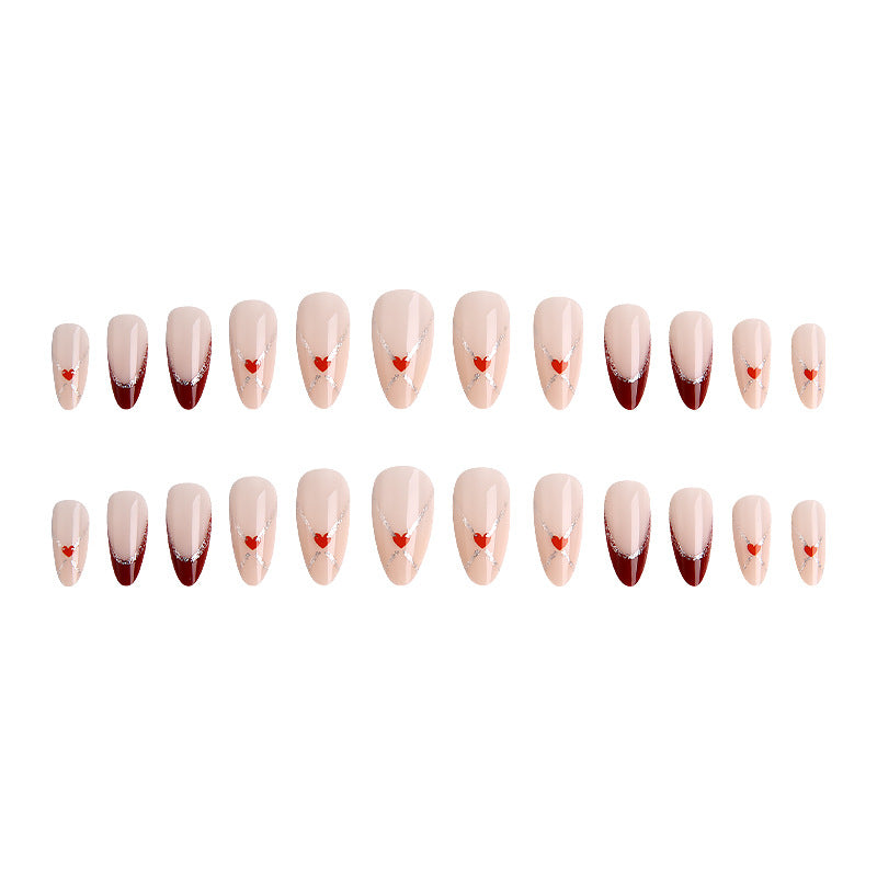 Acrylic nails with heart motifs and glitter details Kalsten