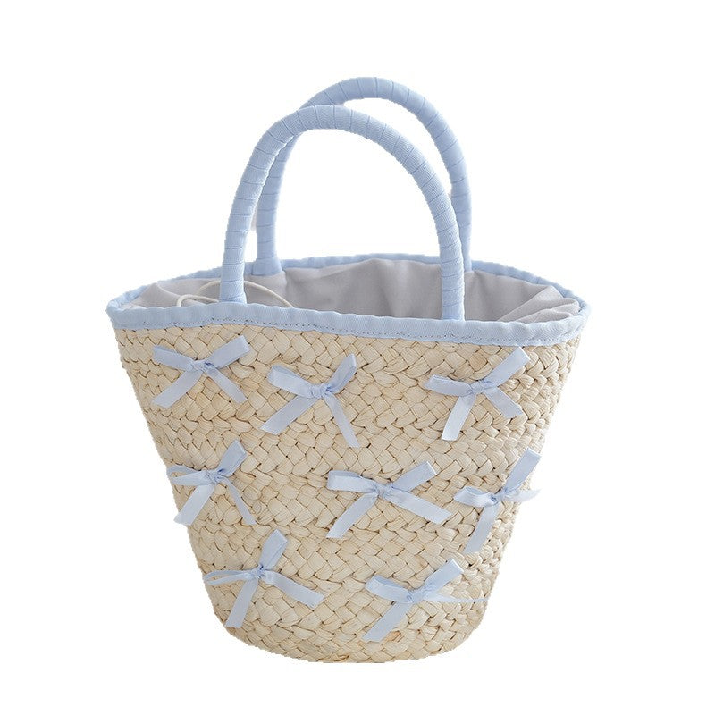 Basket bag with delicate bows and Kalsten lining