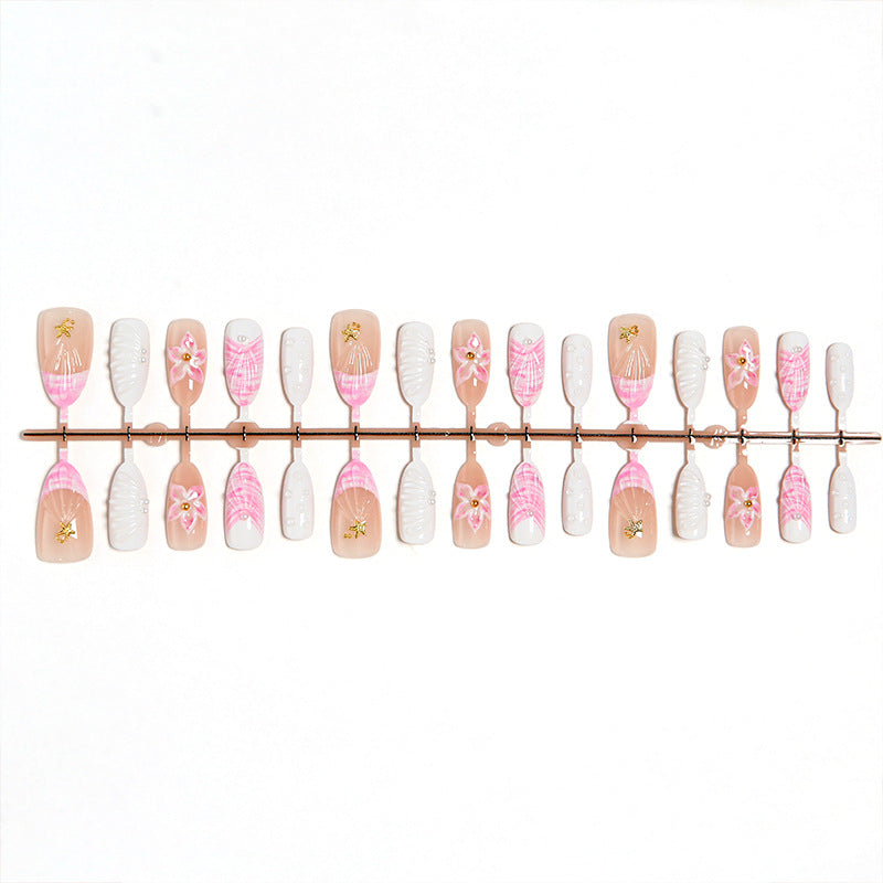 Artificial nail set with floral accents and glitter decorations Kalsten