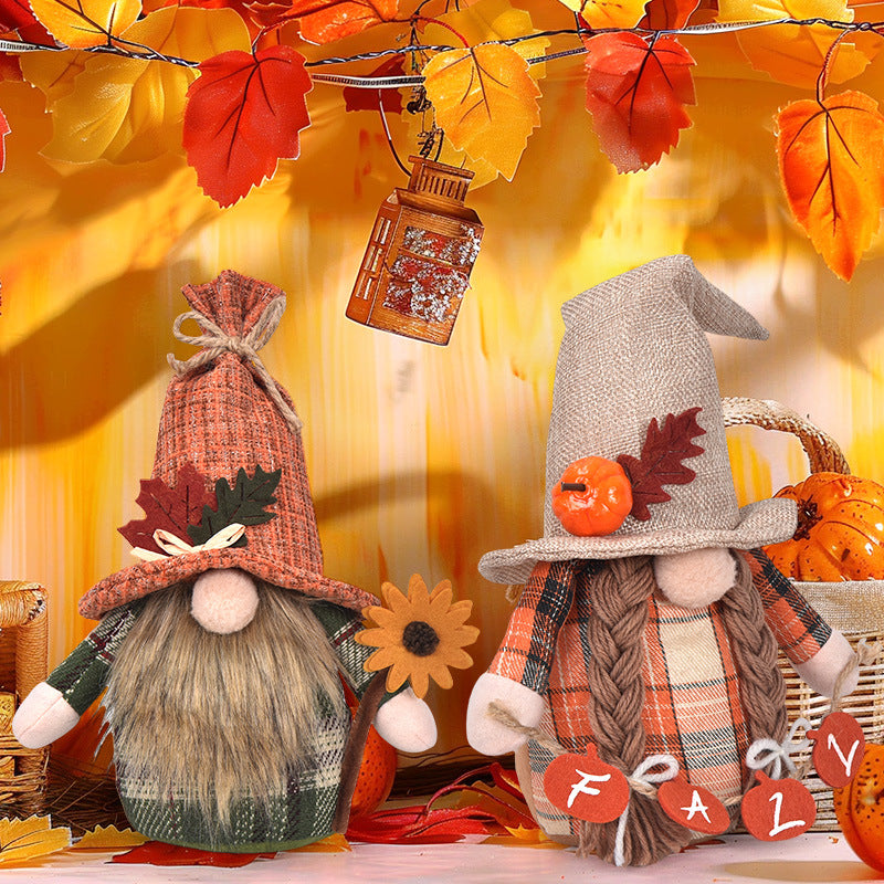 Autumn handmade decorative gnome figure with knitted hat, felt leaf application and pumpkin detail