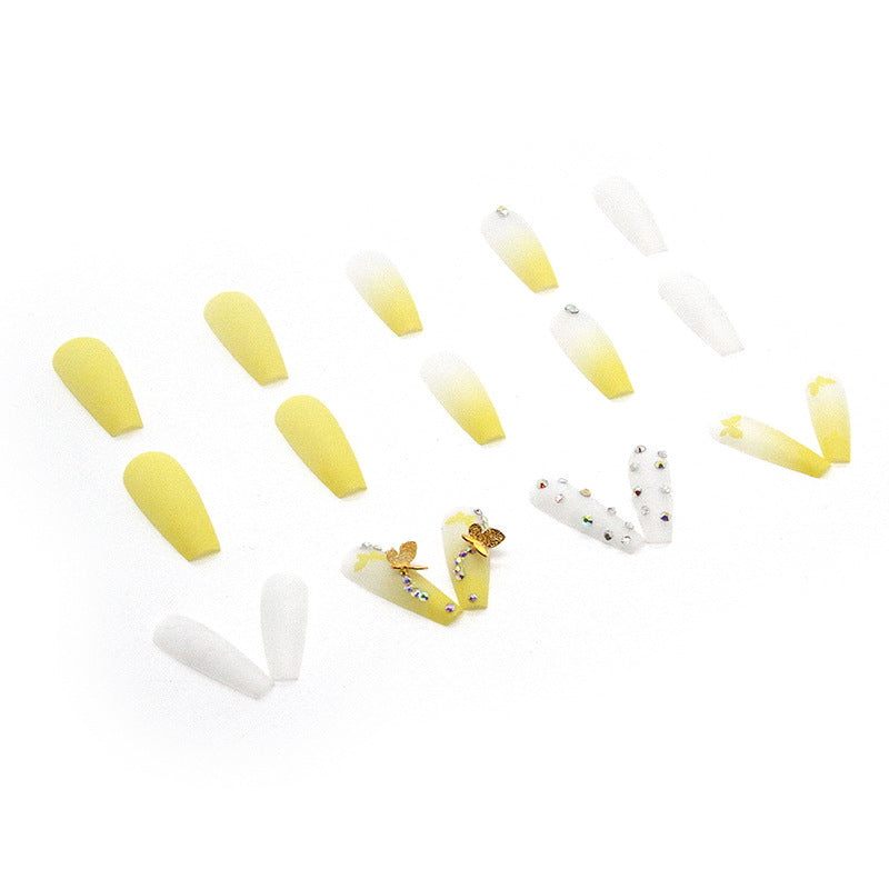 Artificial nail extensions with floral accents and rhinestones Kalsten
