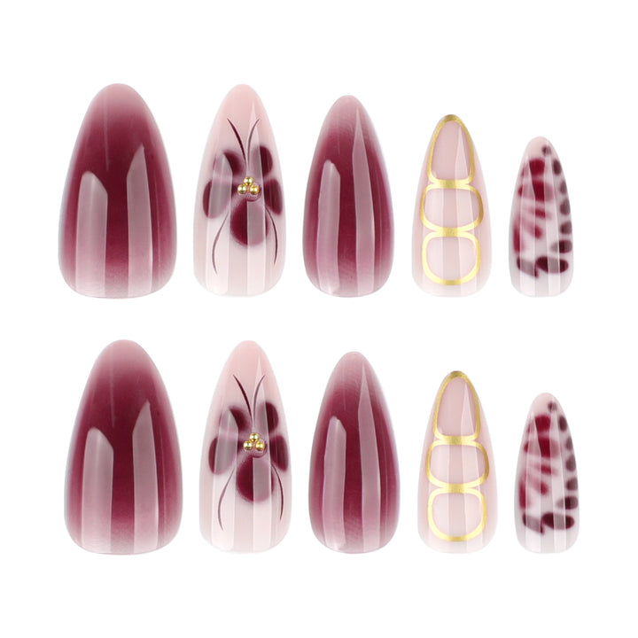 Elegant Nail Art with Floral Design and Glitter Accents Kalsten