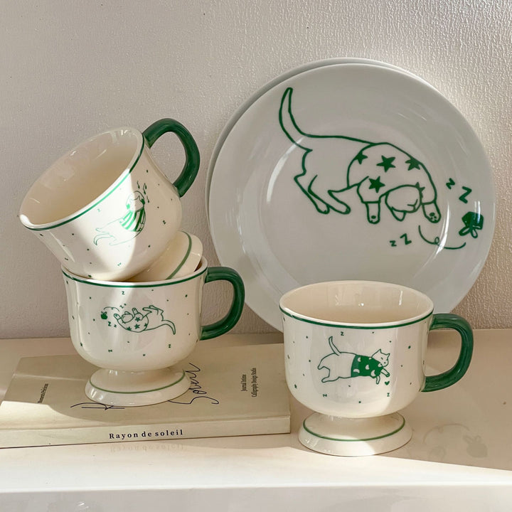 Handcrafted ceramic plate with illustrative cat design