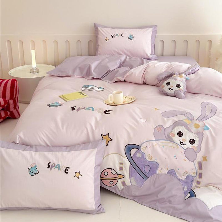 Children's bedding set with playful space bunny design