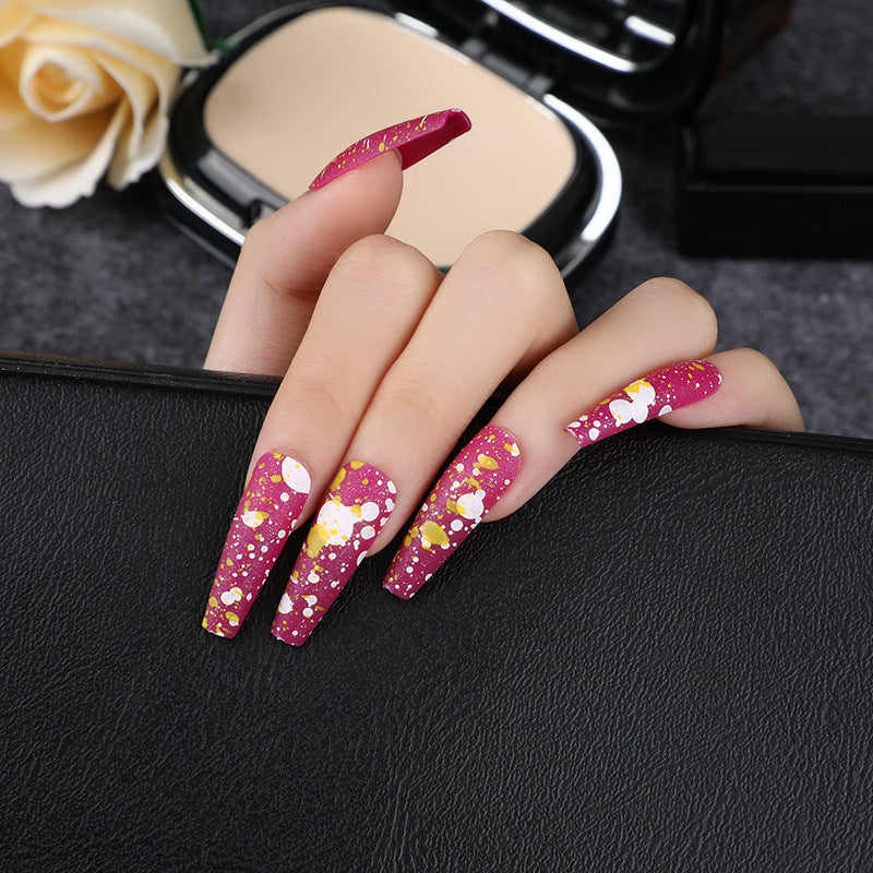 Artistic splatter design artificial nails Kalsten