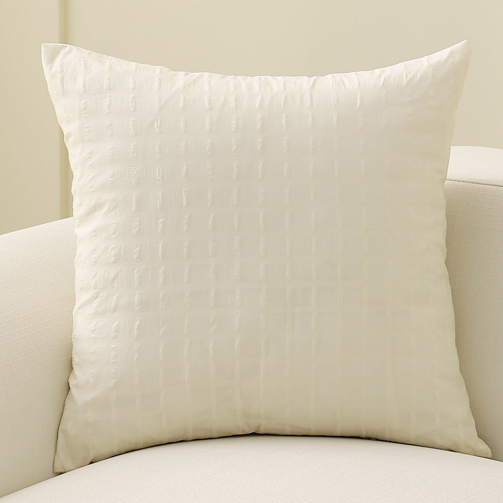 Square decorative cushion with delicate mother-of-pearl look and fine micro tuft structure