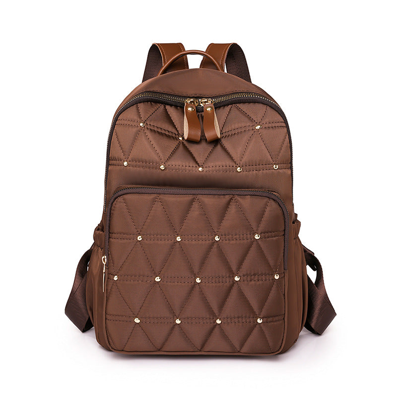Stylish Quilted Backpack with Gold Accents