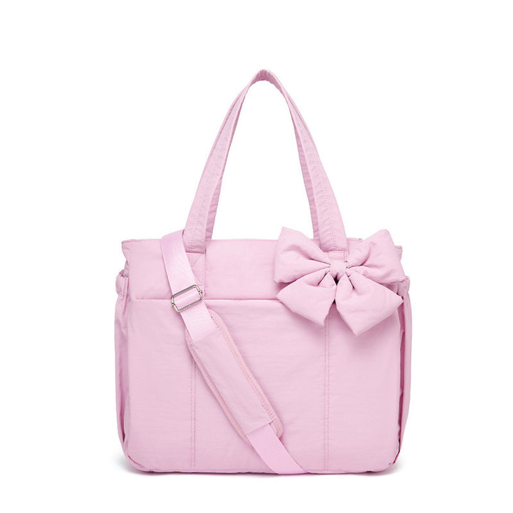 Fashionable tote bag with elegant bow appliqué Kalsten