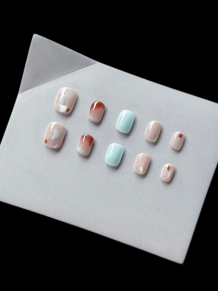 Artistic Press-On Nail Set with Star and Heart Designs