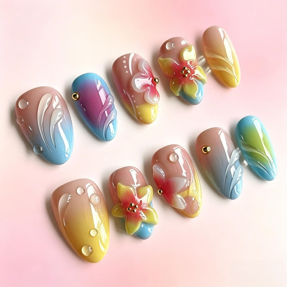 Acrylic nail set with floral elements and colorful accents Kalsten