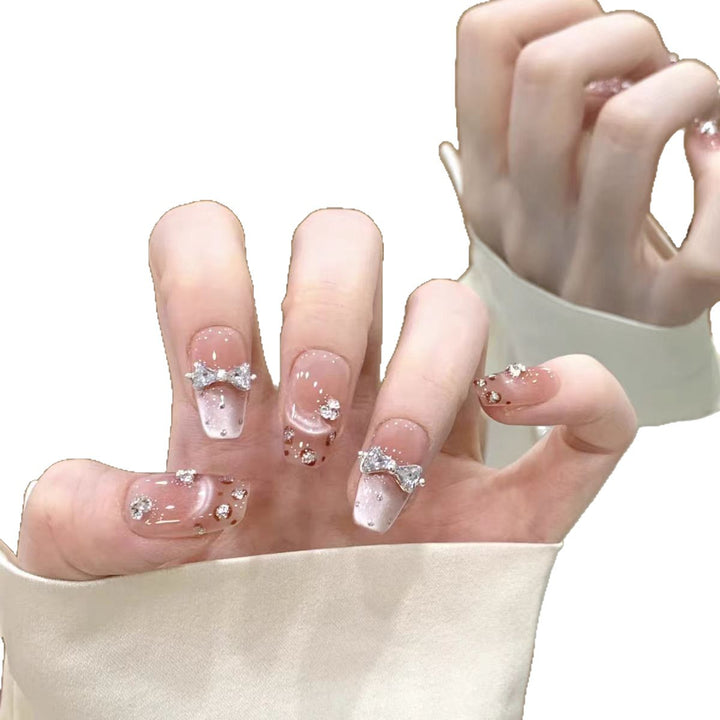 Artistic Press-On Nail Design with Floral Accents Kalsten